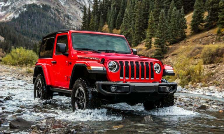2018 Jeep Wrangler JL exterior driving in stream