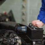 Mechanic charging car battery (1)