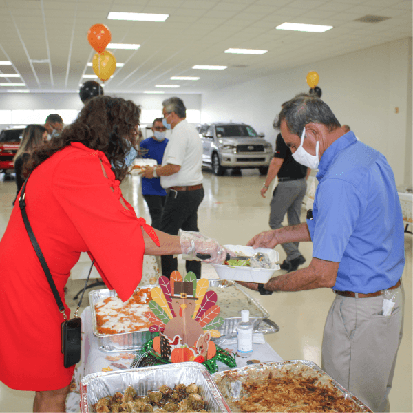 a woman serving food