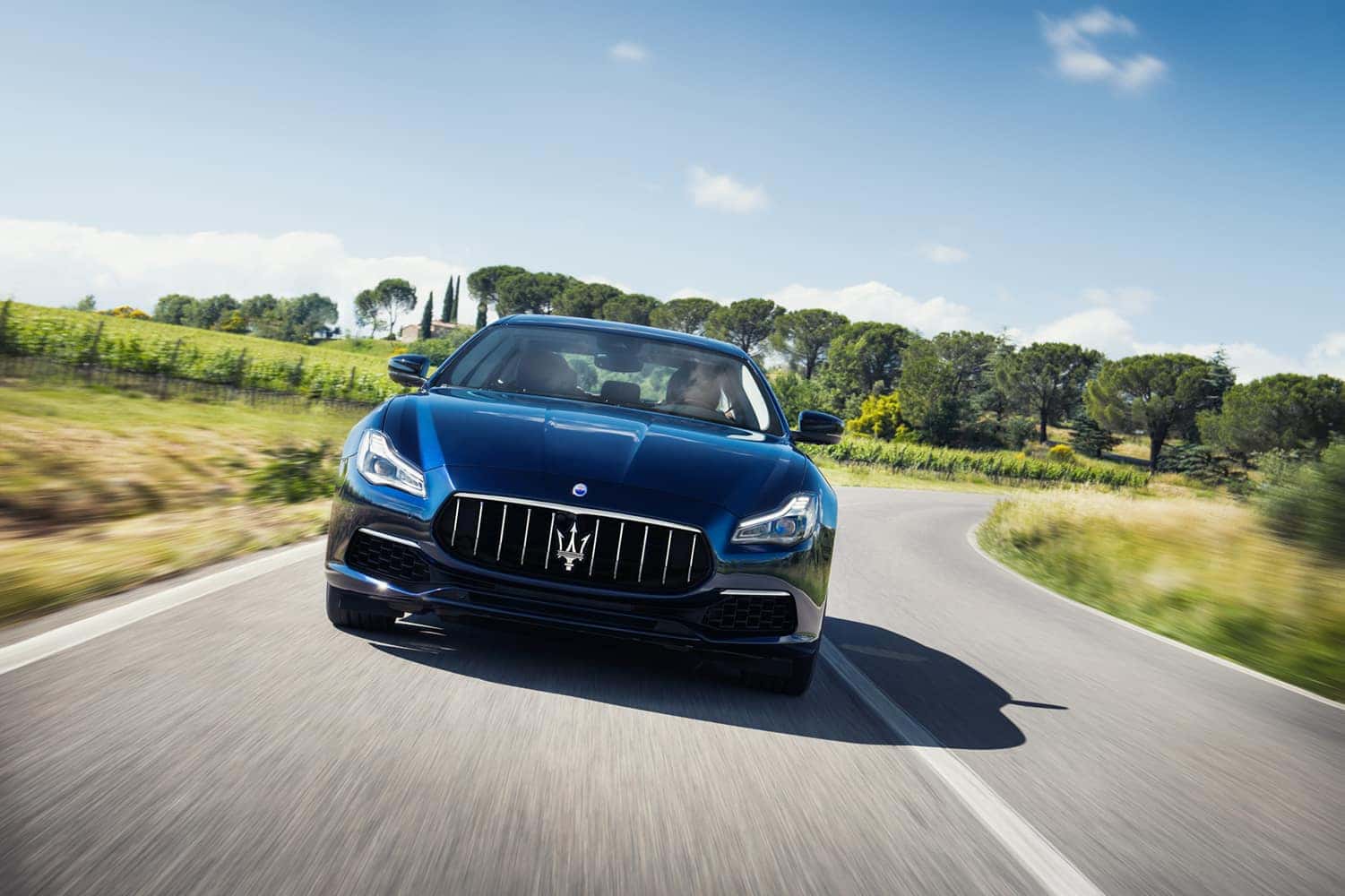 2020 Maserati Quattroporte driving through country roads | Bennett Maserati of Allentown is a Car Dealership near Wescosville PA in Allentown