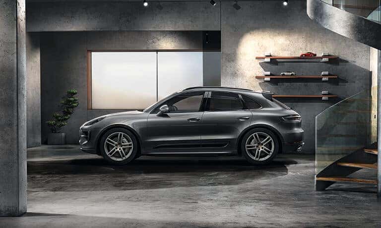 2021 Porsche Macan Parked parked in a large garage