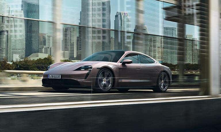 2021 Porsche Taycan driving under and overpass