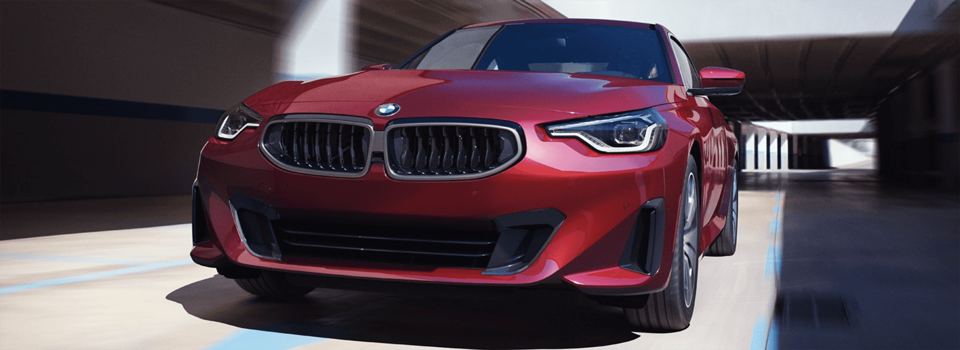 The new 2023 BMW 2 Series in magenta.
