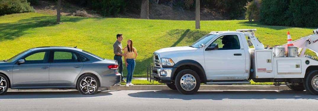 Couple Using Volkswagen 24/7 Roadside Assistance