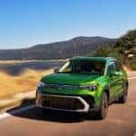 The New And Improved 2025 VW Taos, Driving Past Golden Grass