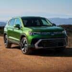 The Affordable 2025 Volkswagen Taos Rolling On A Dirt Road