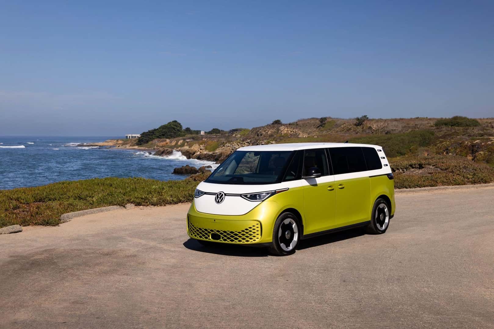 The Bright Pomelo Yellow Exterior Of The Fantastic And Family-Friendly Volkswagen ID Buzz, Parked On The Beach