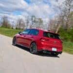2025 Volkswagen Golf GTI Kings Red Metallic in motion