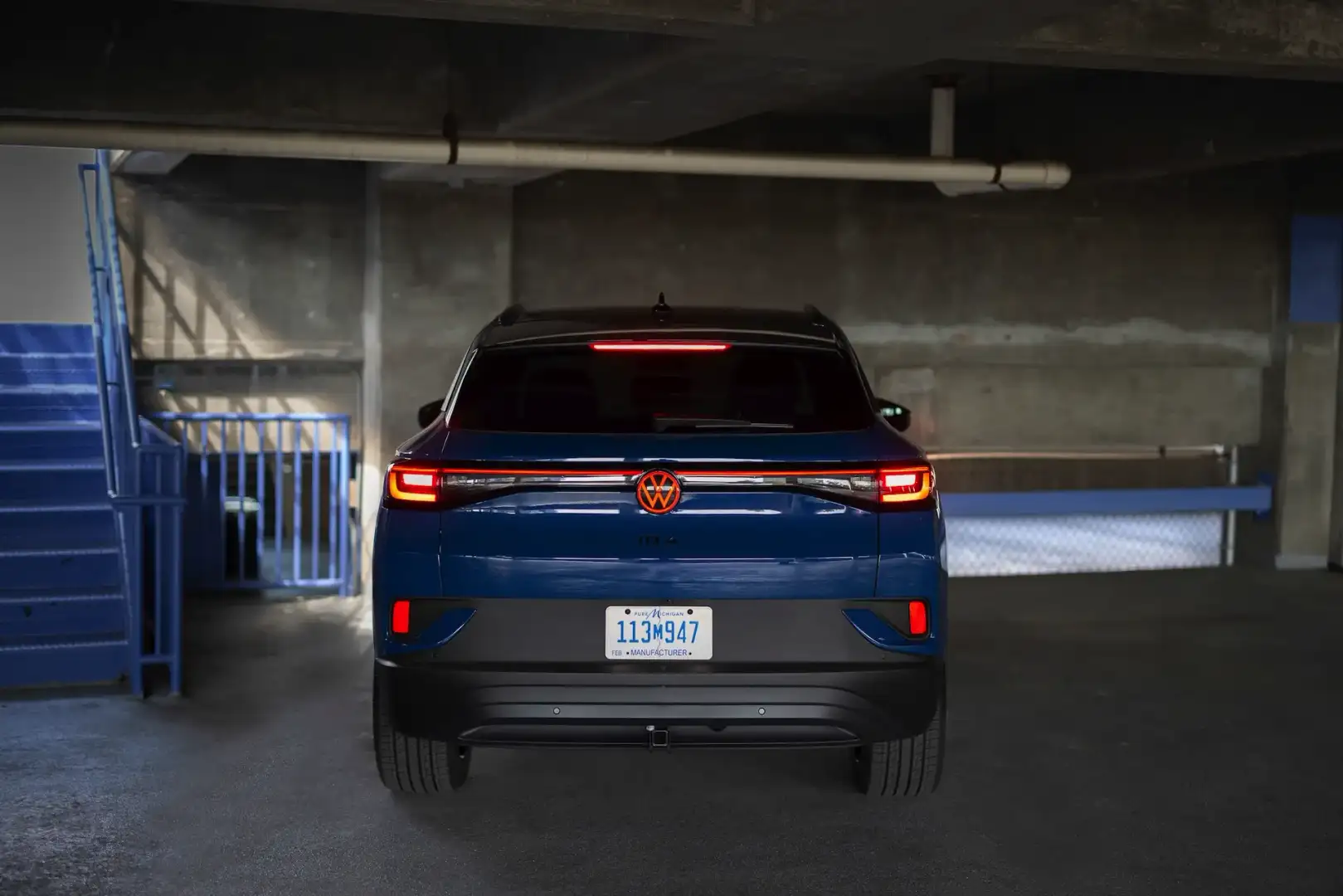 2025 blue VW ID.4 view of the back in parking garage