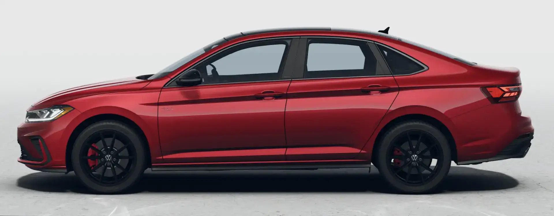 2026 VW Jetta GLI Kings Red Metallic Deep Black Pearl