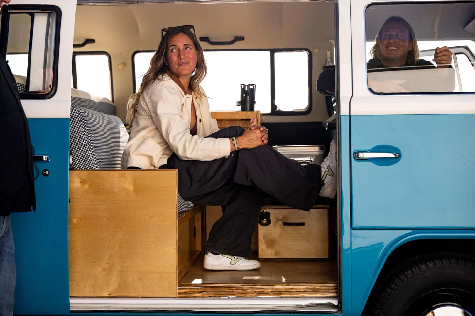 The Smiling Megan Weinrub Sitting In Her Inspirational, Restored Volkswagen T2 Bus