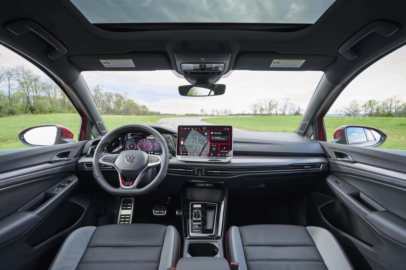 2025 Gold GTI Autobahn Kings Red Metallic Interior Dash and Steering Wheel