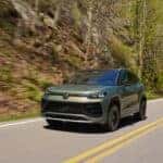 2026 Volkswagen Tiguan SEL Avocado Green in motion
