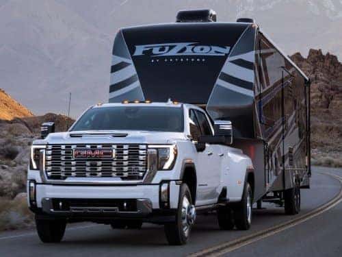 2024 GMC Sierra HD towing a camper