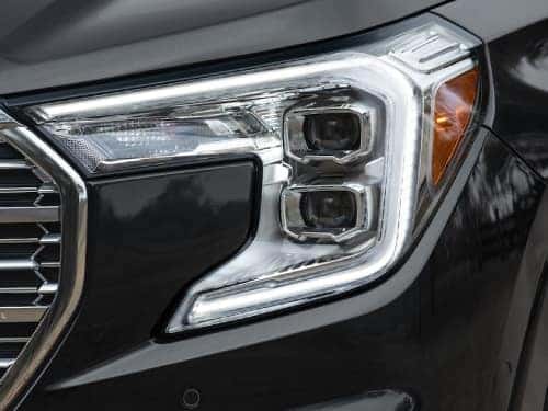 2024 GMC Terrain close up view of front headlight
