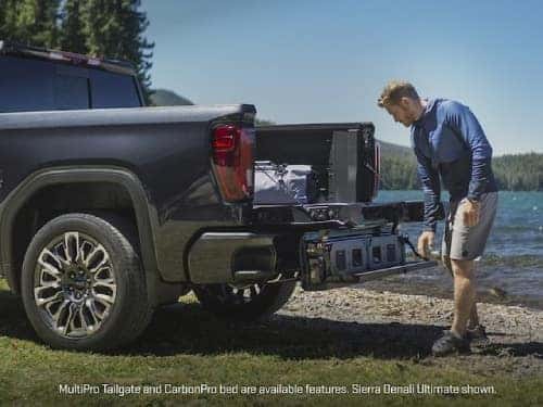 2025 GMC Sierra 1500 view of man using multipro tailgate