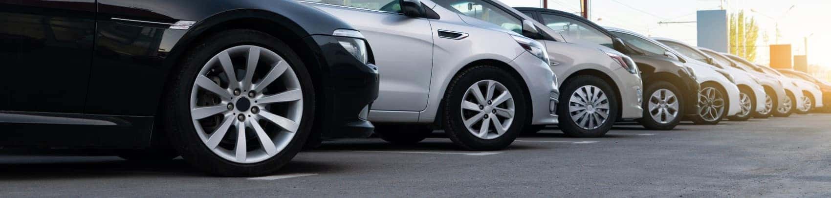 Lineup of cars shot from low angle tires wheels