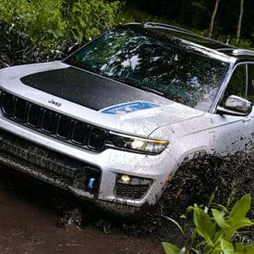 White Jeep Grand Cherokee EV Offroading