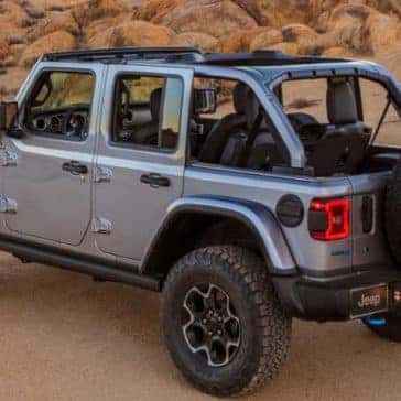 Grey Jeep Wrangler with the top off