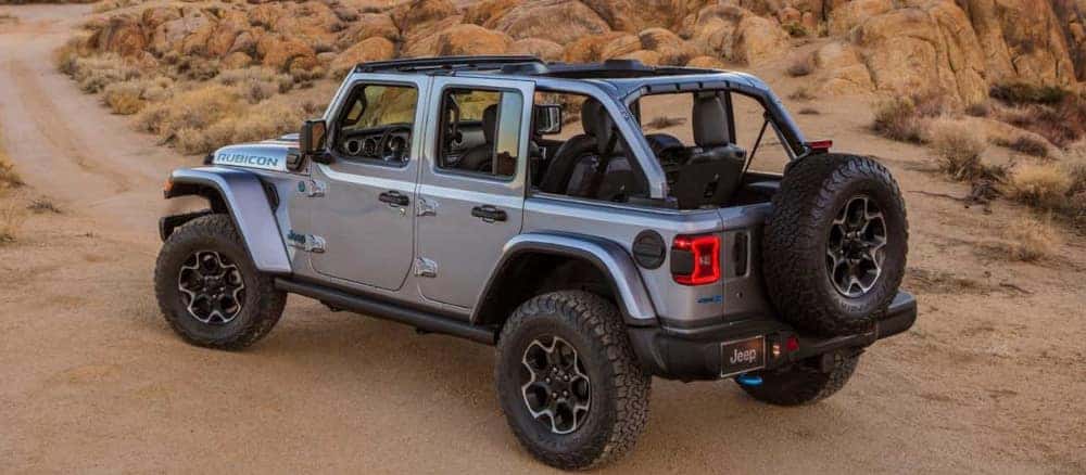 Grey Jeep Wrangler with the top off