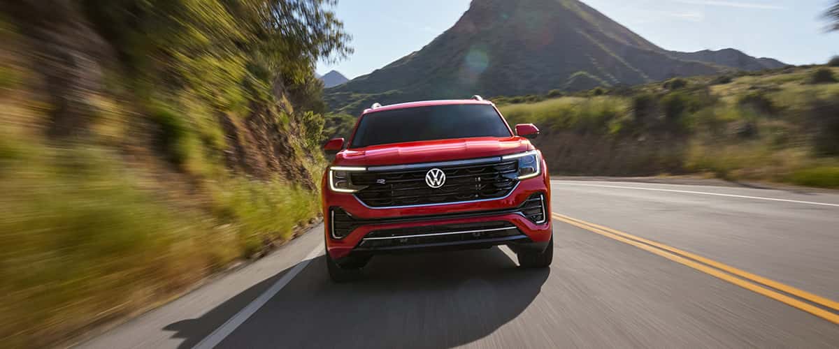VW Altas driving on road