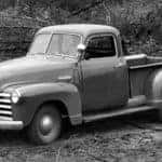 A grey 1947 Chevy 3100 Series is shown from the side.