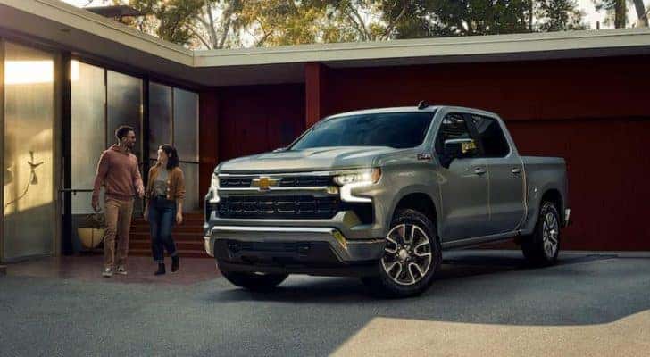 A silver 2022 Chevy Silverado 1500 Z71 for sale near Trussville, AL is shown parked in a driveway.