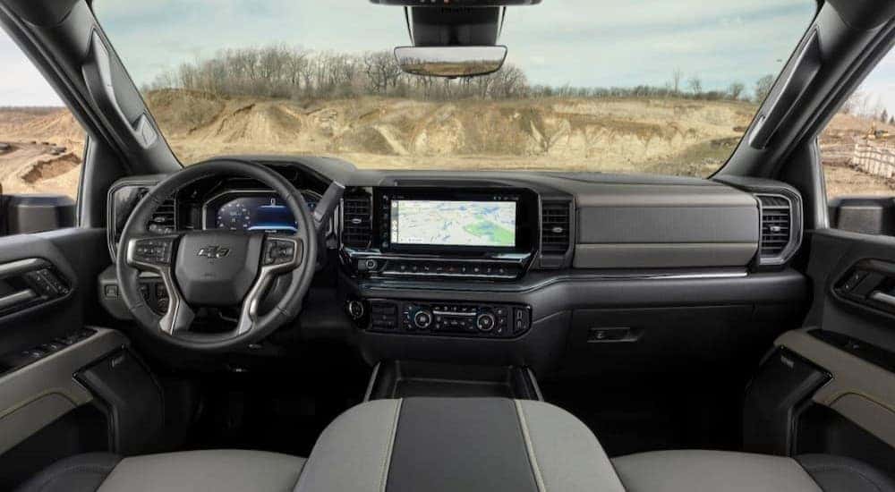 The black and gray interior and dash is shown in a 2024 Silverado 1500 ZR2.