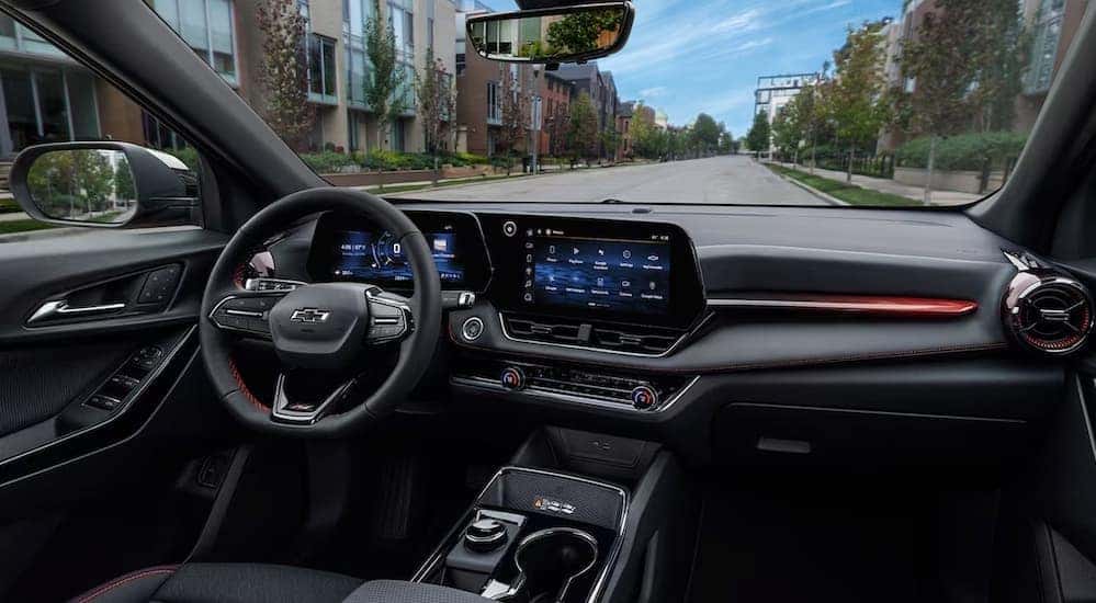 The black interior and dash in a 2025 Chevy Equinox RS is shown.