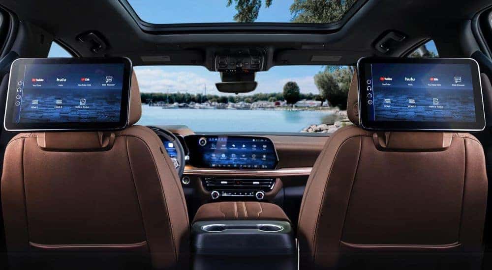 The tan and black interior is shown in a 2025 Chevy Tahoe after shopping for SUVs for sale.