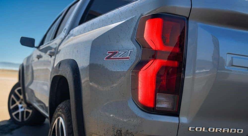Close-up on the taillight of a white 2024 Chevy Colorado Z71.