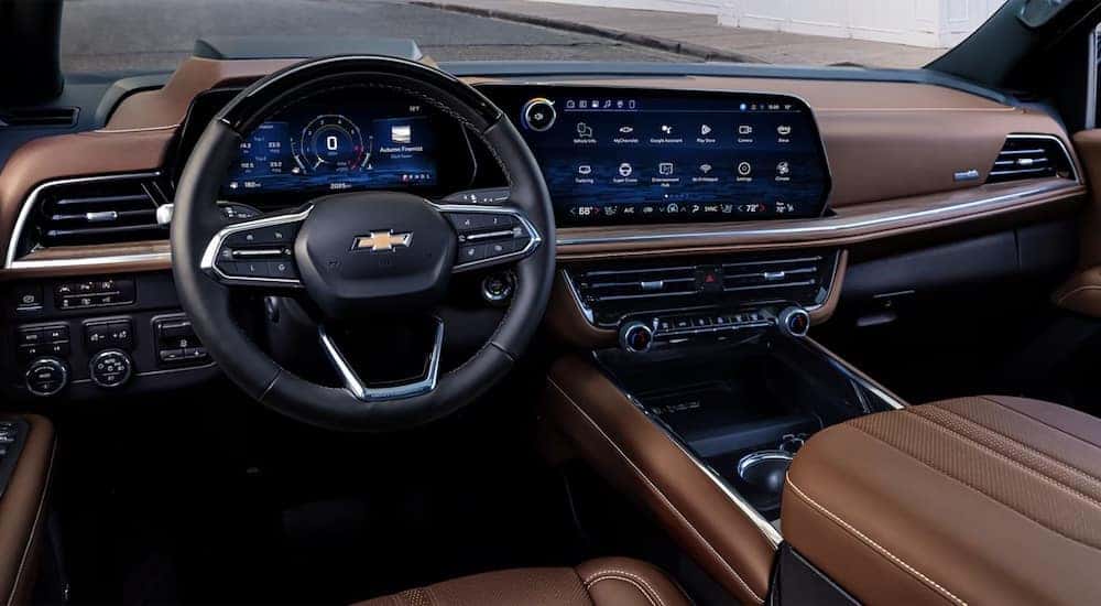 The interior of a 2025 Chevy Tahoe is shown from the driver's seat.