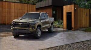 A green 2024 Chevy Colorado is shown parked after viewing trucks for sale near Gardendale.