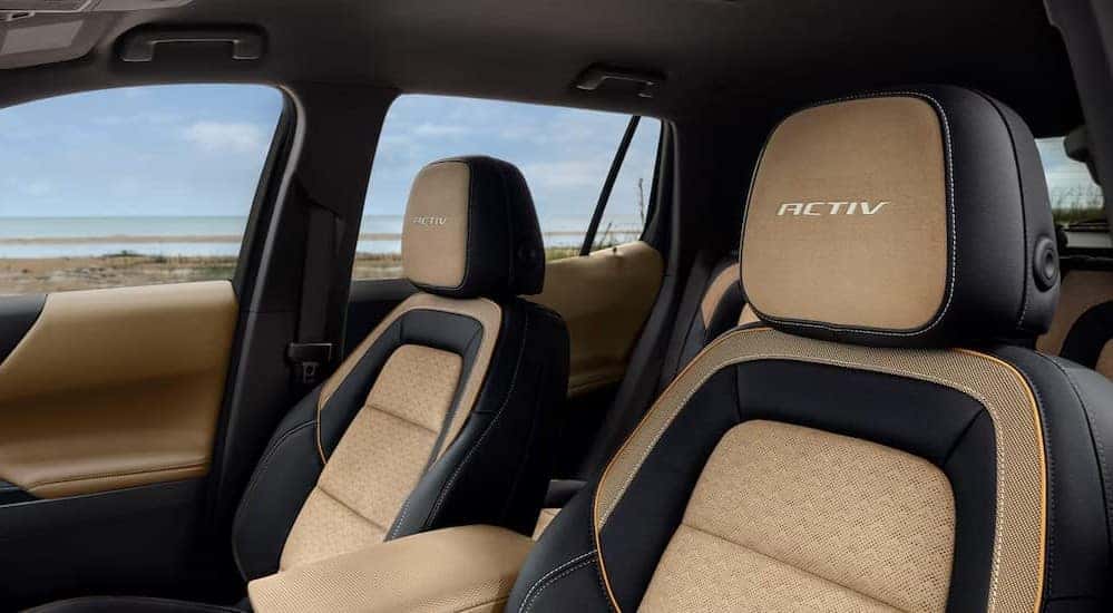 The black and tan interior in a 2025 Chevy Equinox ACTIV.