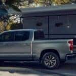 A silver 2025 Chevy Silverado 1500 Z71 parked on a driveway.
