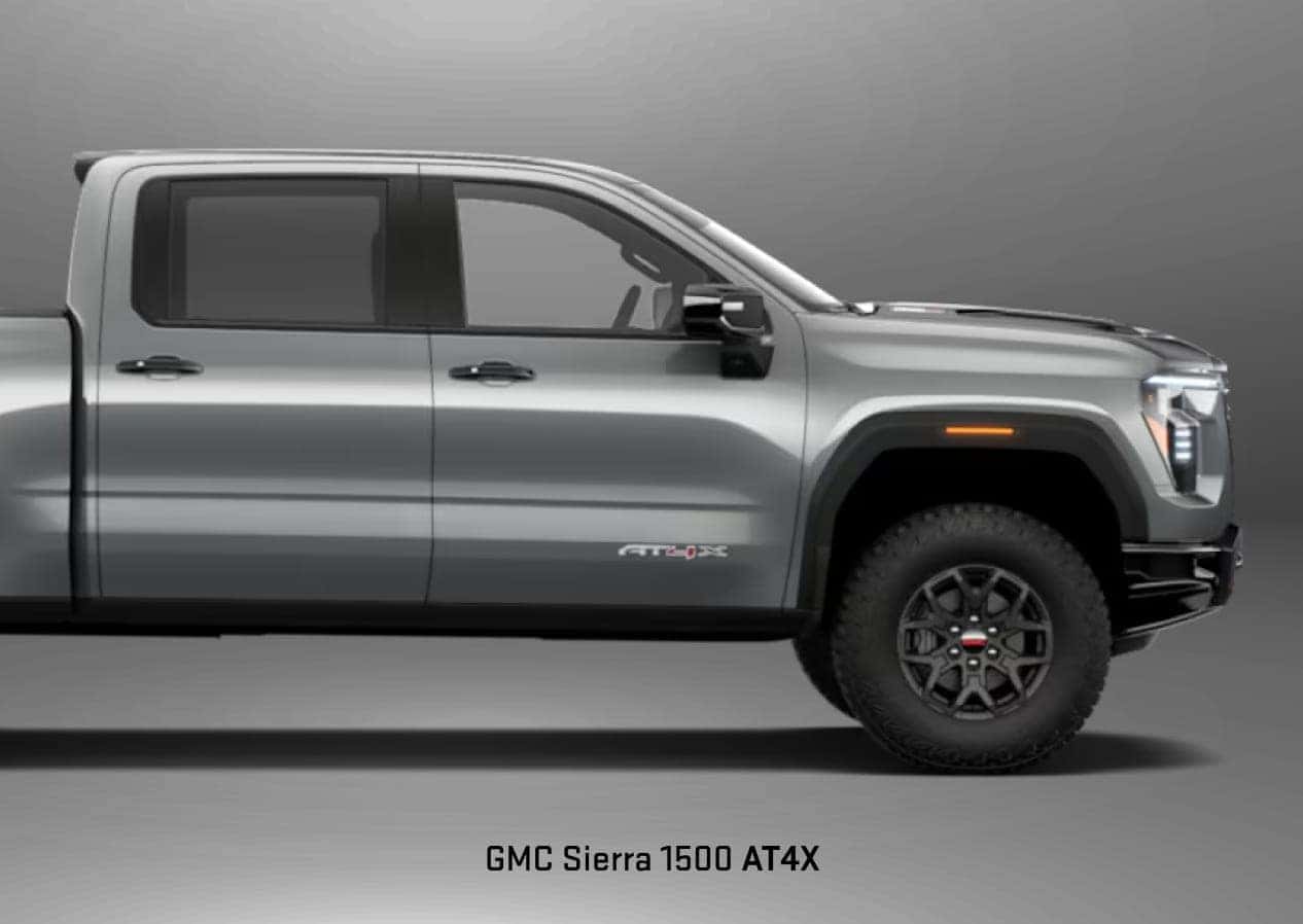 2027 GMC Sierra 1500 AT4X shown from the side, highlighting its rugged tires and off-road stance.