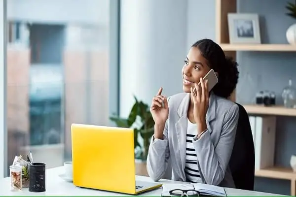 Girl with Yellow Laptop