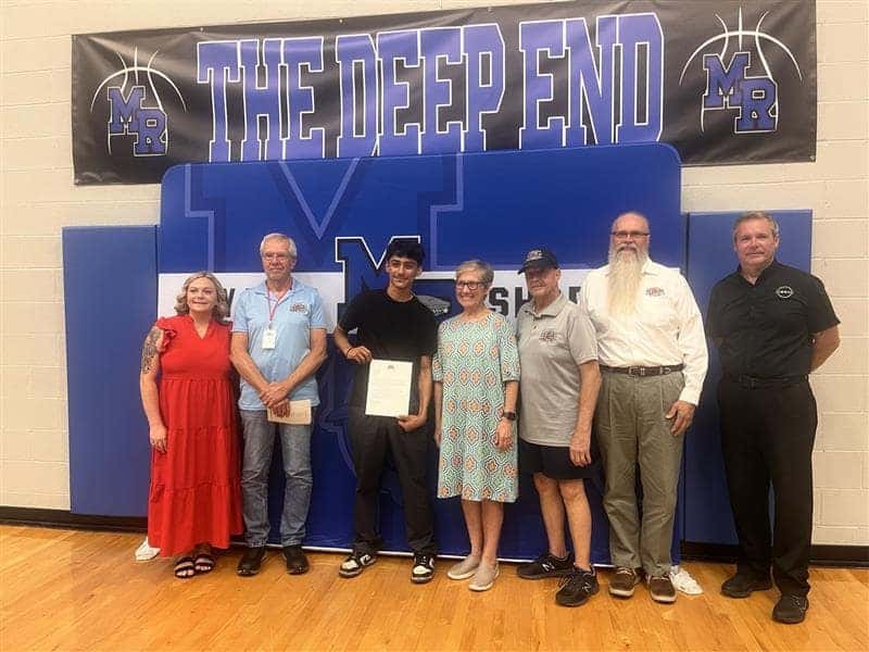 Vaden staff and May River High School staff pose for a picture 