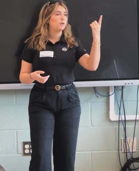 Valentina Ramirez speaking in front of class