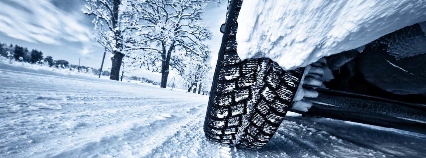 https://di-uploads-pod20.dealerinspire.com/kieferkia/uploads/2019/12/Tires_in_snow.jpg