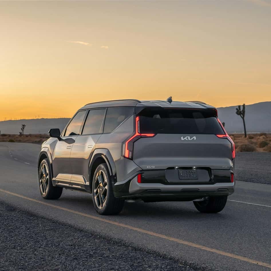 Kia EV9 GT on Scenic Road at Sunset