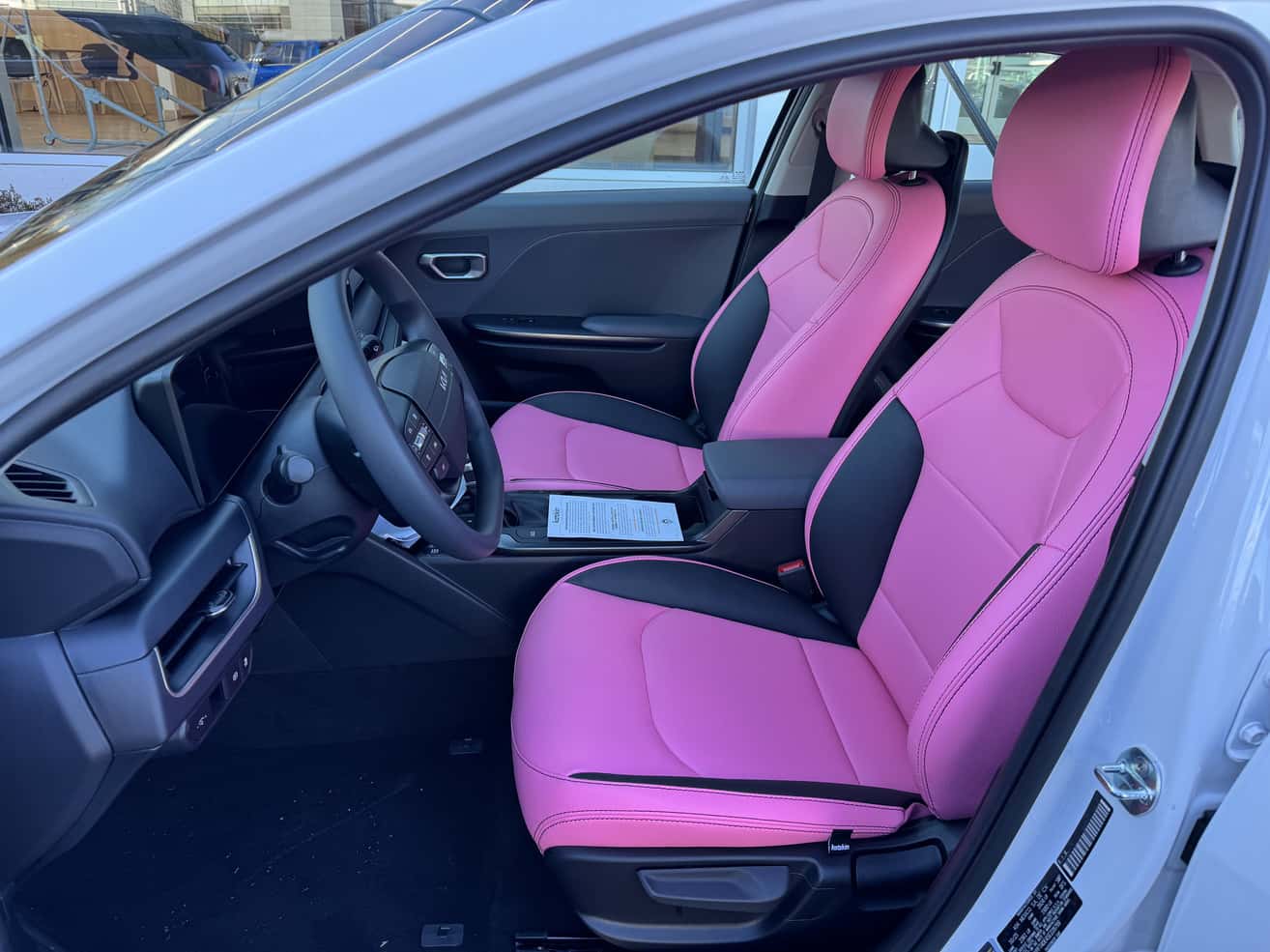 Pink interior of a Kia K4