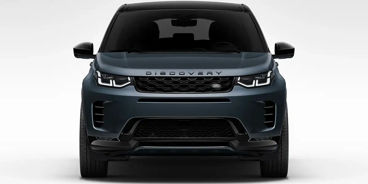 Front view of 2026 Land Rover Discovery Sport Dynamic HSE with bold grille and LED headlights.