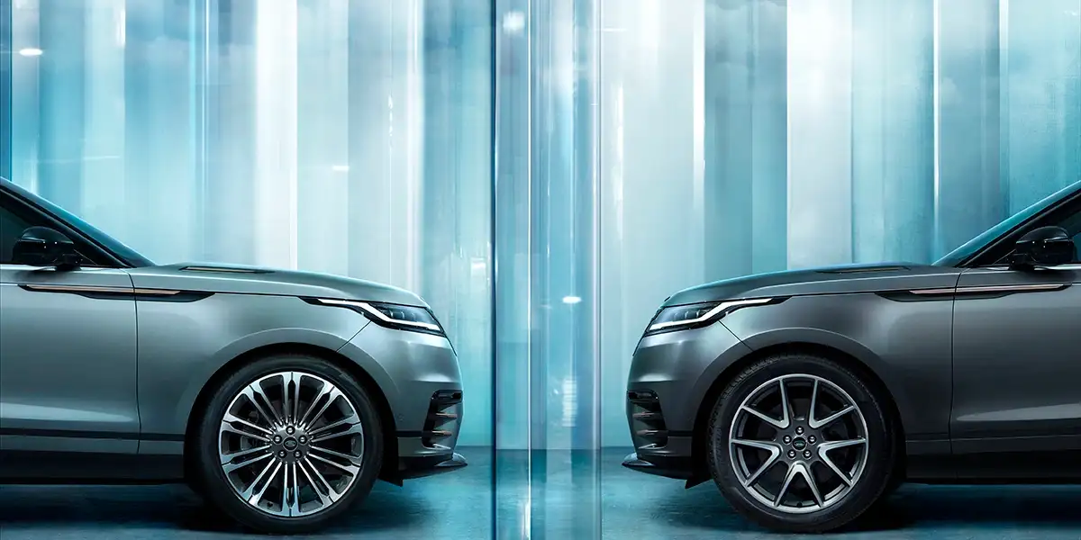2026 Two Range Rover Velar SUVs side by side showcasing front profiles