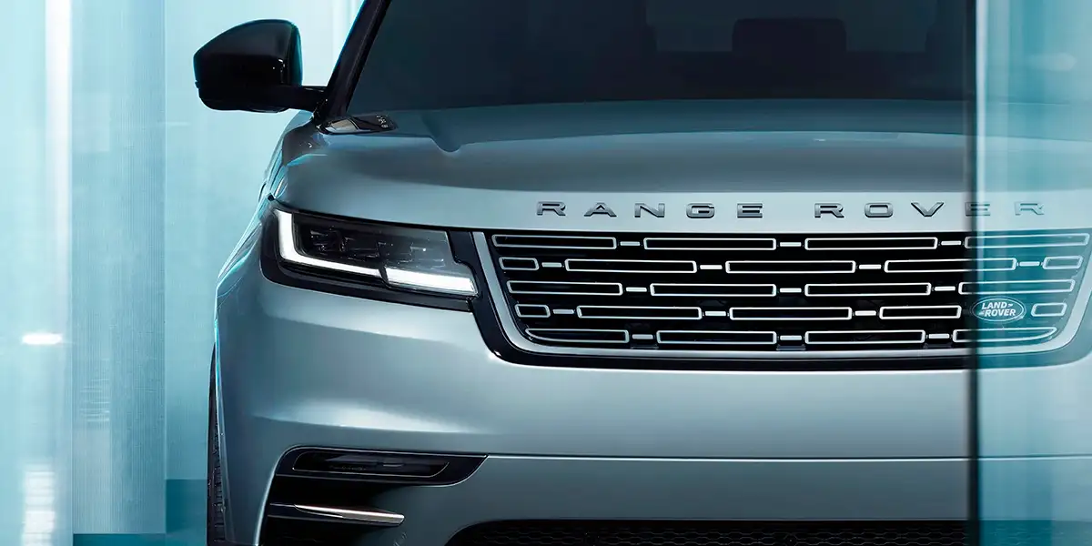 Front view of 2026 Land Rover Discovery Sport Dynamic HSE with bold grille and LED headlights.