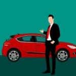 Car dealer doing walk around