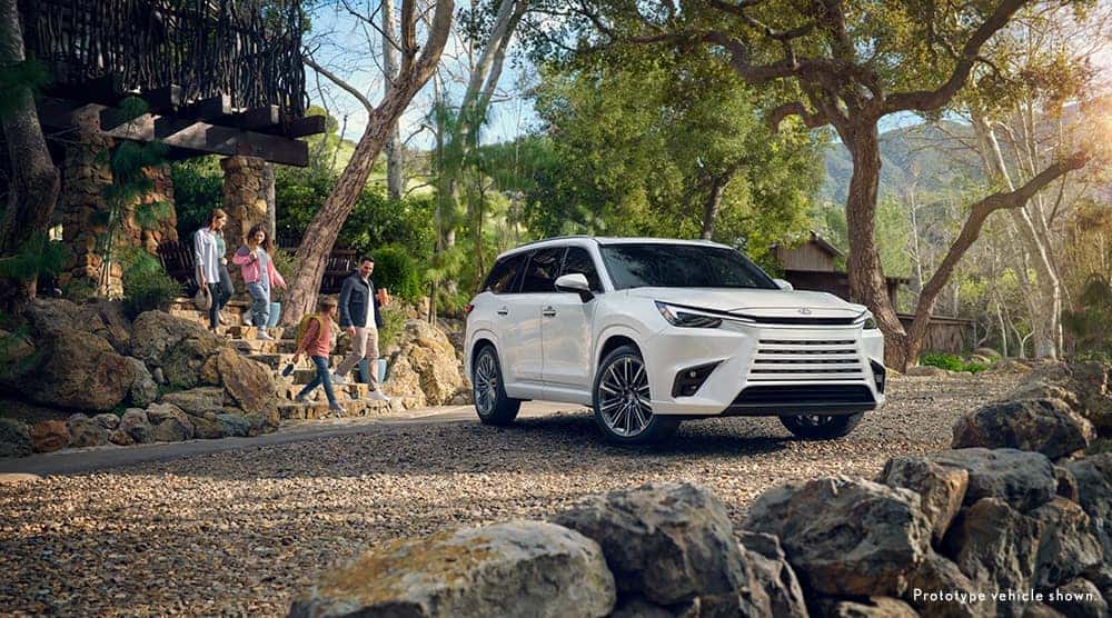 Lexus SUV parked on gravel road
