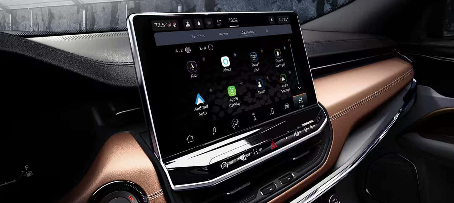 Close-up of the 2024 Jeep Compass technology dashboard displaying navigation and connectivity options