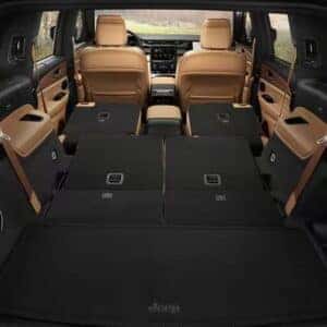 Jeep Grand Cherokee with second and third-row seats folded flat for maximum cargo capacity.