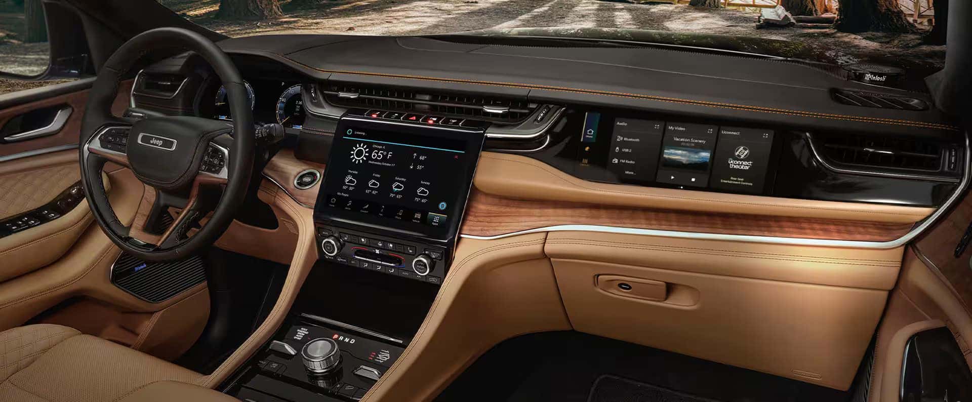 Jeep Grand Cherokee dashboard featuring advanced touchscreen displays, premium materials, and intuitive controls.